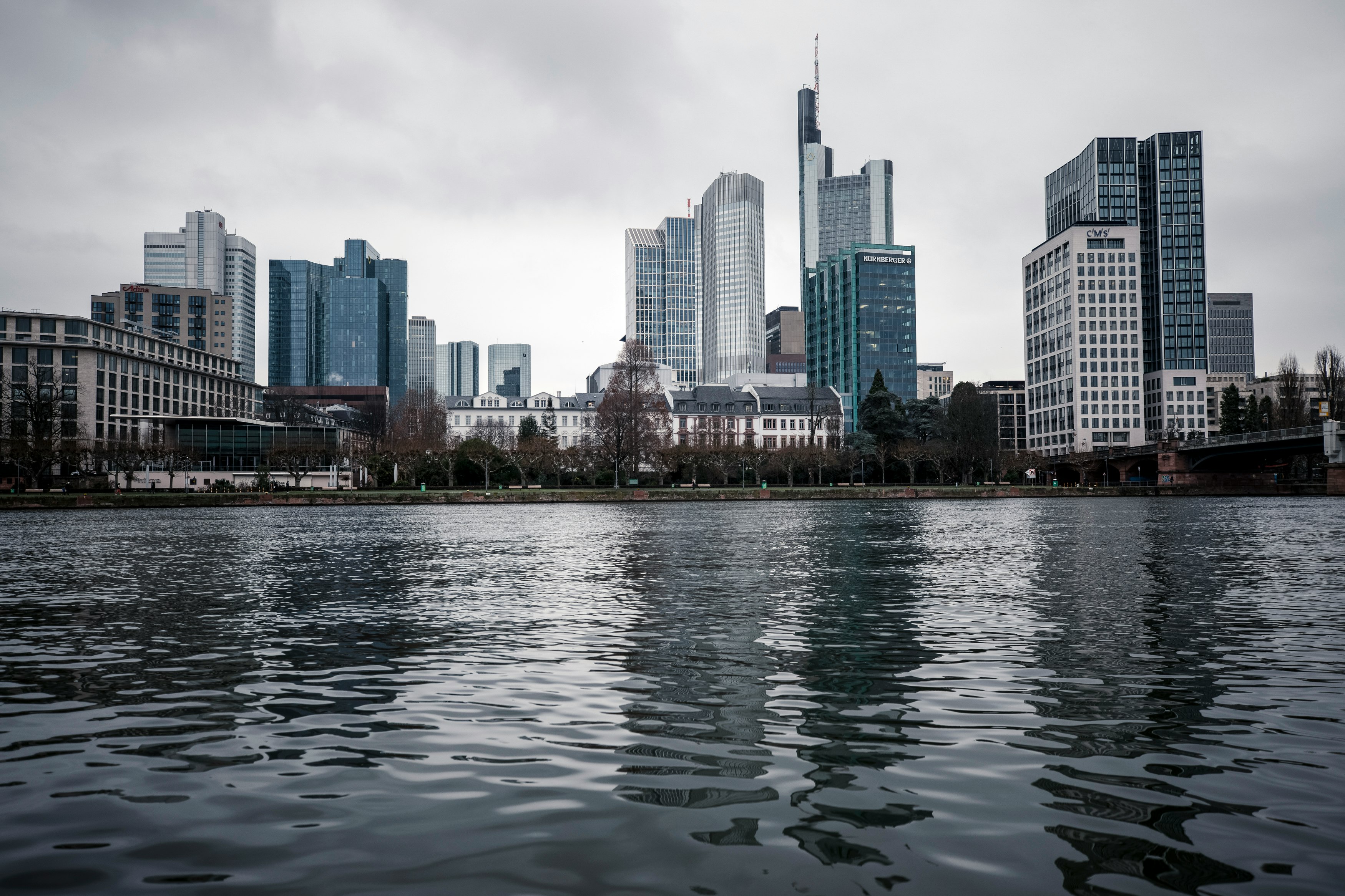 city skyline under gray sky during daytime